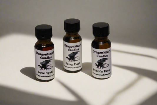 Small fragrance oil bottles with a DragonHeart label wrapped around